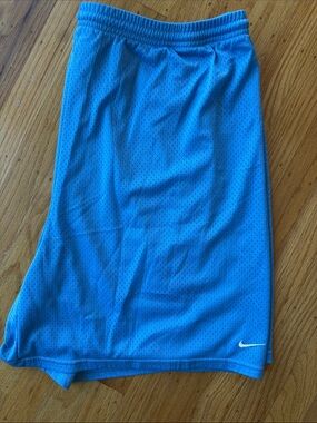 Nike Blue Mesh Athletic Shorts with White Swoosh